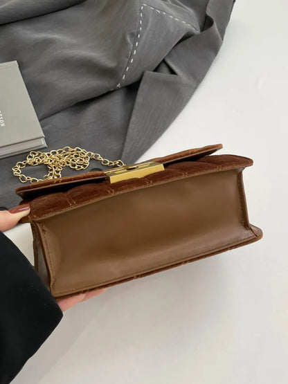 Bolsa de ombro com corrente em cor sólida